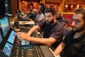 Lighting team programming the show at the grandMA3 console