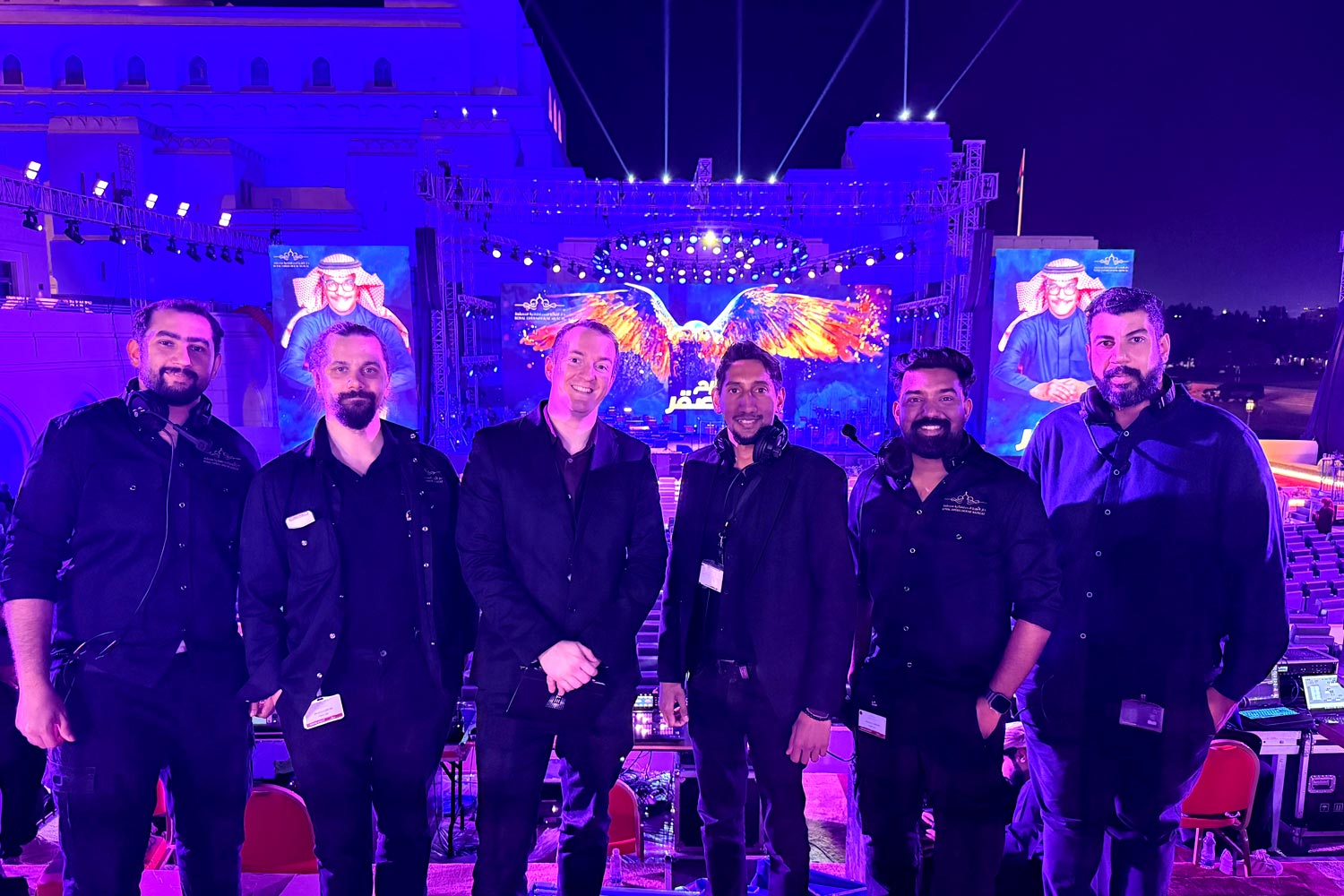 Lighting and production crew at the outdoor stage