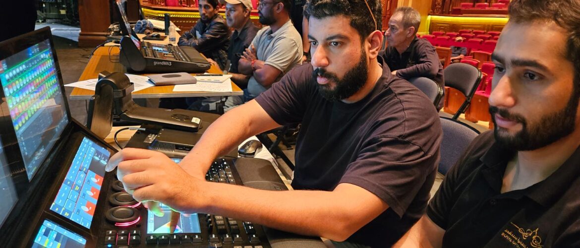 Lighting team programming the show at the grandMA3 console